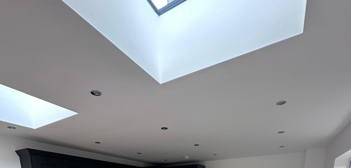 Finished ceiling with recessed LED downlights and roof lanterns wired and installed by DBD Builders Ltd